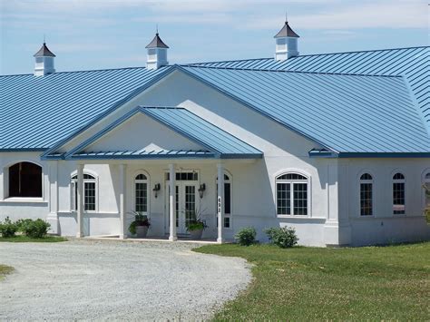 white metal roof on blue house|colors for metal roof houses.